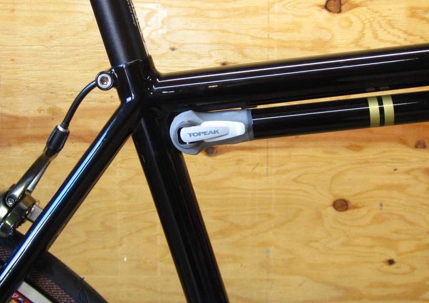 Ira Ryan brazing a custom steel frame in the Portland workshop